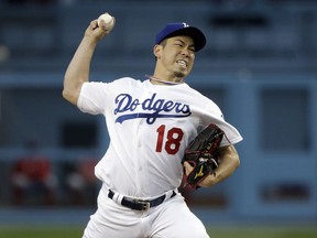 Los Angeles Dodgers starting pitcher Kenta Maeda throws to a Washington Nationals batter during the first inning of a baseball game Friday, May 10, 2019, in Los Angeles.