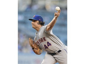 New York Mets starting pitcher Jason Vargas throws during the first inning of the team's baseball game against the Los Angeles Dodgers on Thursday, May 30, 2019, in Los Angeles.