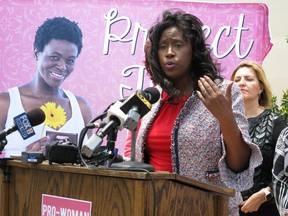 Rep. Katrina Jackson, D-Monroe, talks to reporters about her bill asking voters to add language into the state constitution declaring that it doesn't protect abortion rights, on Tuesday, May 21, 2019, in Baton Rouge, La. The bill is nearing final legislative passage.