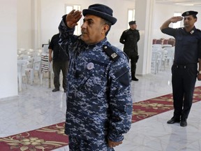 In this Thursday, May 2, 2019 photo, police attend their graduation ceremony in Benghazi, Libya. After years of assassinations, bombings and militia firefights, Libya's eastern city of Benghazi finally feels safe again -- but security has come at a staggering cost. Forces loyal to Khalifa Hifter, who now controls eastern Libya, have cracked down on dissent. In a report issued last month, the Tripoli-based Libyan Center for Freedom of the Press documented 29 attacks on reporters by Hifter's forces over the past year and a half, more than any other armed group.
