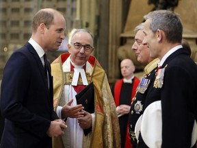 Britain's Prince William, Duke of Cambridge, left, arrives to attend a service to recognise fifty years of continuous deterrent at sea in his capacity as Commodore-in-Chief of the Submarine Service, at Westminster Abbey in London, Friday, May 3, 2019.