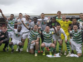Celtic players celebrate after the final whistle of their Scottish Premiership soccer match against Aberdeen at Pittodrie Stadium, Aberdeen, Scotland, Saturday, May 4, 2019. Celtic won the Scottish league title for the eighth straight year on Saturday, completing the second leg in its bid to clinch a domestic treble for the third straight season. A 3-0 win at Aberdeen moved Celtic into an unassailable 12-point lead in the Scottish Premiership.