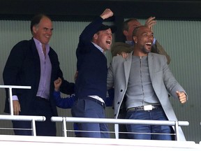 Britain's Prince William, second left, and former footballer John Carew, right, celebrate after Aston Villa's Anwar El Ghazi scores his side's first goal of the game during the English Championship Play-off soccer final between Aston Villa and Derby County at Wembley Stadium, London, Monday, May 27, 2019.