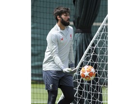 Liverpool goalkeeper Alisson takes part in a training session at the Liverpool soccer team media open day, in Liverpool, England, Tuesday, May 28, 2019, ahead of their Champions League Final soccer match against Tottenham on Saturday in Madrid.