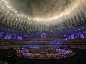 FILE - In this Sunday, June 28, 2015 file photo, fireworks explode above the Baku Olympic stadium in Baku, Azerbaijan, during the closing ceremony of the 2015 European Games. Arsenal says the choice of Azerbaijan capital Baku to host the Europa League final has caused "unacceptable" and "extreme" travel problems for fans. Arsenal and Chelsea have been given just 6,000 tickets each by UEFA for the May 29, 2019 game, in a stadium with a capacity of 68,700. Arsenal says even those tickets may not sell out because of the difficulty of getting to Azerbaijan.