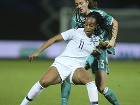 FILE - In this Thursday, Feb. 28, 2019 file photo, France forward Marie-Antoinette Katoto challenges for the ball with Germany midfielder Sara Dabritz during a women's international friendly soccer match between France and Germany at Francis-le-Basser stadium in Laval, western France. Coach Corinne Diacre has defended her decision to leave out Paris Saint-Germain striker Marie-Antoinette Katoto from France Women's World Cup squad. France will host the tournament from June 7, 2019 to July 7, 2019.