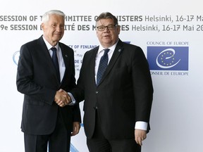 Foreign Minister of Finland Timo Soini, right, welcomes Secretary General of the Council of Europe Thorbjorn Jagland to the Commemoration Ceremony of the 70th anniversary of the Council of Europe in Helsinki, Finland, Thursday May 16, 2019.