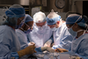 Surgeons at work during Maurice Desjardins’ face transplant.