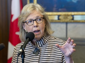 Green party Leader Elizabeth May speaks with reporters on May 7, 2019, in Ottawa.
