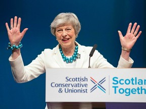 rime Minister Theresa May addresses delegates during the Scottish Conservatives' annual party conference at the Aberdeen Exhibition and Conference Centre, Friday May 3, 2019.