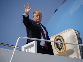 President Donald Trump waves as he boards Air Force One for a trip to New York to attend a fundraiser, Thursday, May 16, 2019, at Andrews Air Force Base, Md.