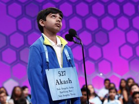 Akash Vukoti, 9, of San Angelo, Texas, competes in the second round of the Scripps National Spelling Bee, Tuesday, May 28, 2019, in Oxon Hill, Md.