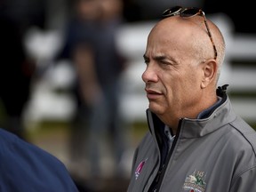 Mark Casse, trainer of Preakness Stakes entrant War of Will, watches Thursday, May 16, 2019, at Pimlico Race Course in Baltimore. The Preakness Stakes horse race is scheduled to take place Saturday, May 18.