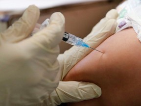 New Brunswick health authorities are advising staff and students at a Saint John high school that they must receive a measles booster shot if they want to continue going to the school.