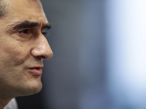 FC Barcelona's coach Ernesto Valverde gestures during a press conference at the Sports Center FC Barcelona Joan Gamper in Sant Joan Despi, Spain, Friday, May 24, 2019. FC Barcelona will play against Valencia in the Spanish Copa del Rey soccer match final on Saturday.