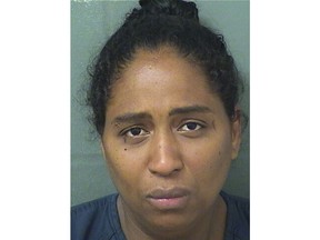 This May 9, 2019 photo made available by the Palm Beach County Sherif's Office shows Rafaelle Sousa under arrest. Sousa is charged with attempted murder and child abuse after she delivered a baby girl, put her in a plastic bag and tossed her into a dumpster. The baby was found alive. (Palm Beach County Sheriff's Office via AP)