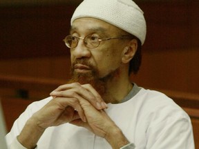 FILE- In this March 11, 2002 file photo, Jamil Abdullah Al-Amin watches during the sentencing portion of his trial in Atlanta. Al-Amin, the militant civil rights leader known in the 1960s as H. Rap Brown who was convicted of killing Fulton County Sheriff's Deputy Ricky Kinchen and wounding Deputy Aldranon English in a shootout in March 2000,  is challenging his imprisonment, saying his constitutional rights were violated at trial.