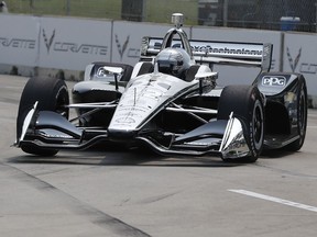 Simon Pagenaud, of France, rounds the seventh turn during practice for the first race of the IndyCar Detroit Grand Prix auto racing doubleheader, Friday, May 31, 2019, in Detroit.