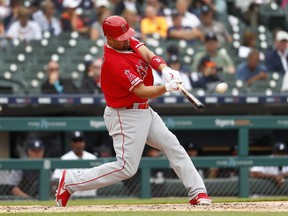 Los Angeles Angels' Albert Pujols hits a solo home run in the third inning of a baseball game against the Detroit Tigers in Detroit, Thursday, May 9, 2019. The home run was his 2,000th career RBI.