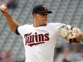 Minnesota Twins pitcher Jose Berrios throws against the Houston Astros in the first inning of a baseball game Thursday, May 2, 2019, in Minneapolis.