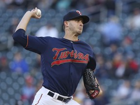 Minnesota Twins pitcher Jake Odorizzi throws to a Detroit Tigers batter during the first inning of a baseball game Friday, May 10, 2019, in Minneapolis.