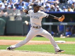 CORRECTS THE YEAR TO 2019, NOT 2018 AS ORIGINALLY SENT - New York Yankees starting pitcher Domingo German throws in the first inning against the Kansas City Royals during a baseball game Sunday, May 26, 2019, in Kansas City, Mo.