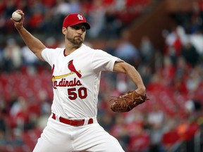 St. Louis Cardinals starting pitcher Adam Wainwright throws during the first inning of the team's baseball game against the Pittsburgh Pirates on Friday, May 10, 2019, in St. Louis.