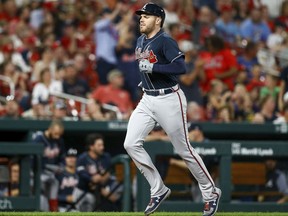 Atlanta Braves' Freddie Freeman runs the bases after hitting a solo home run during the sixth inning of a baseball game against the St. Louis Cardinals, Friday, May 24, 2019, in St. Louis.