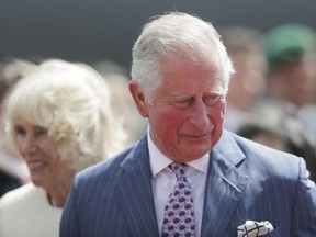 Britain's Prince Charles, the Prince of Wales and his wife Camilla, Duchess of Cornwall, arrive for a four days visit in Germany, at the airport Tegel in Berlin, Germany, Tuesday, May 7, 2019.