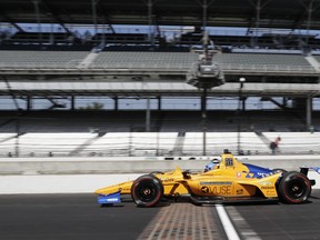 Fernando Alonso, of Spain, leaves the pits during practice for the Indianapolis 500 IndyCar auto race at Indianapolis Motor Speedway, Tuesday, May 14, 2019, in Indianapolis.
