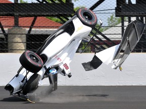 The car driven by Kyle Kaiser goes airborne after hitting the wall along the third turn during practice for the Indianapolis 500 IndyCar auto race at Indianapolis Motor Speedway, Friday, May 17, 2019 in Indianapolis.