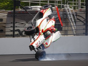 The car driven by Patricio O'Ward, of Mexico, goes airborne after hitting the wall in the second turn during practice for the Indianapolis 500 IndyCar auto race at Indianapolis Motor Speedway, Thursday, May 16, 2019 in Indianapolis.