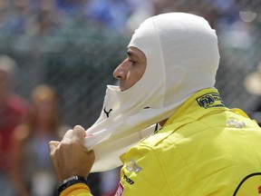 Helio Castroneves, of Brazil, prepares to practice for the Indianapolis 500 IndyCar auto race at Indianapolis Motor Speedway, Thursday, May 16, 2019 in Indianapolis.