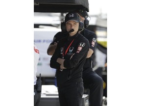 In this Tuesday, May 14, 2019 photo, George Steinbrenner IV watches during practice for the Indianapolis 500 IndyCar auto race at Indianapolis Motor Speedway in Indianapolis. The 22-year-old Steinbrenner is part owner of Harding Steinbrenner Racing team. Their driver, Colton Herta, qualified for the fifth starting position in Sunday's Indianapolis 500.