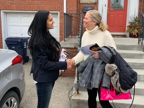 Nadirah Nazeer, left, a Conservative candidate in the Oct. 21, 2019, federal election, campaigns in the Toronto riding of Beaches East-York on April 6, 2019.