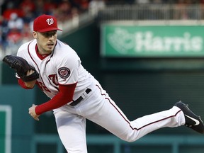 Washington Nationals starting pitcher Patrick Corbin follows through on a pitch to the New York Mets in the second inning of a baseball game, Wednesday, May 15, 2019, in Washington.