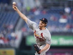St. Louis Cardinals starting pitcher Miles Mikolas throws during the first inning of the team's baseball game against the Washington Nationals, Wednesday, May 1, 2019, in Washington.