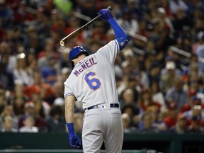 New York Mets' Jeff McNeil reacts after striking out in the fifth inning of a baseball game against the Washington Nationals, Wednesday, May 15, 2019, in Washington. Washington won 5-1.