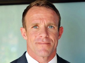 This 2018 photo provided by Andrea Gallagher shows her husband, Navy SEAL Edward Gallagher. The decorated Navy SEAL is facing charges of premeditated murder and other offenses in connection with the fatal stabbing of a teenage Islamic State prisoner under his care in Iraq in 2017 and the shooting of unarmed Iraqi civilians. His attorney says he will plead not guilty to all the charges at a Naval hearing Friday, Jan. 4, 2019, in San Diego. (Andrea Gallagher via AP) ORG XMIT: LA501