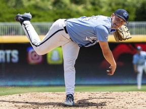North Carolina's Hansen Butler (24) pitches during the ACC NCAA  college baseball championship game against Georgia Tech, in Durham, N.C., Sunday, May 26, 2019.