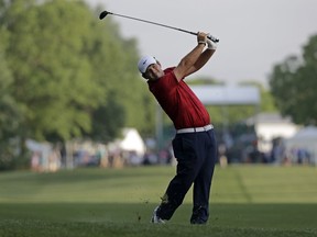 Patrick Reed hits from the 10th fairway during the first round of the Wells Fargo Championship golf tournament at Quail Hollow Club in Charlotte, N.C., Thursday, May 2, 2019.