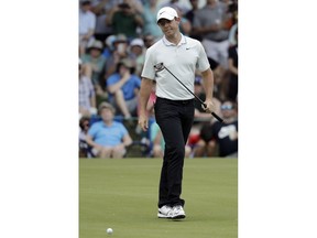 Rory McIlroy, of Northern Ireland, reacts to his putt on the second hole during the third round of the Wells Fargo Championship golf tournament at Quail Hollow Club in Charlotte, N.C., Saturday, May 4, 2019.