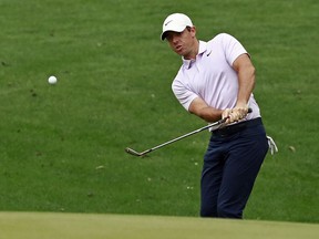 Rory McIlroy, of Northern Ireland, chips to the 15th hole during the second round of the Wells Fargo Championship golf tournament at Quail Hollow Club in Charlotte, N.C., Friday, May 3, 2019.