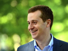 FILE - In this May 8, 2018 file photo Ninth Congressional district Democratic candidate Dan McCready smiles as he speaks with U.S. Rep. Alma Adams outside Eastover Elementary School in Charlotte, N.C. State Sen. Dan Bishop on Tuesday, May 14, 2019, topped nine other GOP candidates seeking the 9th Congressional District nomination with almost half of the ballots cast. He will face Democrat McCready, as well as Libertarian and Green candidates, on Sept. 10.