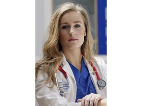In this May 2, 2019, photo, Savanah Harshbarger, a medical student at Duke University, poses for a photo on campus in Durham, N.C. Harshbarger estimates she did as many as 10 pelvic exams last year on patients who were under anesthesia for gynecologic surgeries. Bills introduced in roughly a dozen states this year would require that women undergoing gynecological surgeries give explicit approval to a pelvic exam beforehand. It's a step that some medical experts say is an unnecessary intrusion into care.
