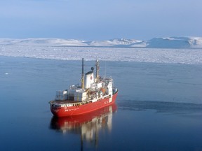 The CCGS Amundsen, a Canadian ice-breaker, navigates near Devon Island in the Northwest Passage.