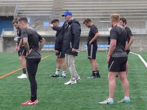Toronto Wolfpack coach Brian McDermott directs players at a team practice at Lamport Stadium on Wednesday, May 1, 2019. As coach of the transatlantic Wolfpack, Brian McDermott doesn't have the presence or profile of his some of his Toronto coaching counterparts.
