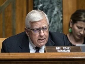 FILE - In this March 27, 2019 file photo, Sen. Mike Enzi, R-Wyo., chairman of the Senate Budget Committee, makes an opening statement on the fiscal year 2020 budget resolution, on Capitol Hill in Washington.  Enzi announced Saturday, May 4  that he will not run for a fifth term in 2020. The 75-year-old made the announcement in his hometown of Gillette.