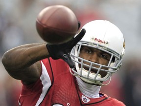 FILE - In this Sunday, Jan. 1, 2012 file photo, Arizona Cardinals' Patrick Peterson warms up prior to an NFL football game against the Seattle Seahawks in Glendale, Ariz. Arizona Cardinals All-Pro cornerback Patrick Peterson has been suspended for the first six games of the 2019 season for violating the NFL's performance-enhancing drug policy. The NFL did not specify Thursday, May 16, 2019 which illegal substance Peterson allegedly used.