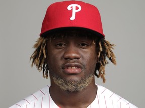 FILE - This is a 2018 file photo showing Odubel Herrera of the Philadelphia Phillies baseball team. Philadelphia Phillies outfielder Odubel Herrera has been placed on administrative leave by Major League Baseball following his arrest in a domestic violence case at an Atlantic City casino. The commissioner's office put Herrera on leave Tuesday, May 28, 2019, a day after his arrest on an assault charge at the Golden Nugget casino.